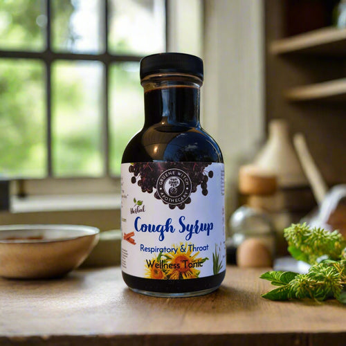 Bottle of cough syrup with a label on a wooden surface outdoors